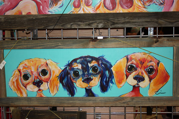 Painting of three dogs